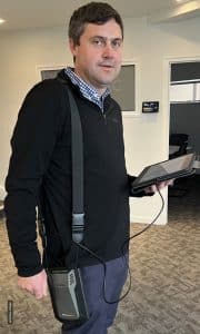 James holding Ekahau unit